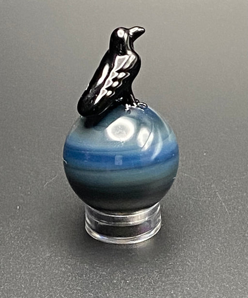 Heretic Glass Marble Crow